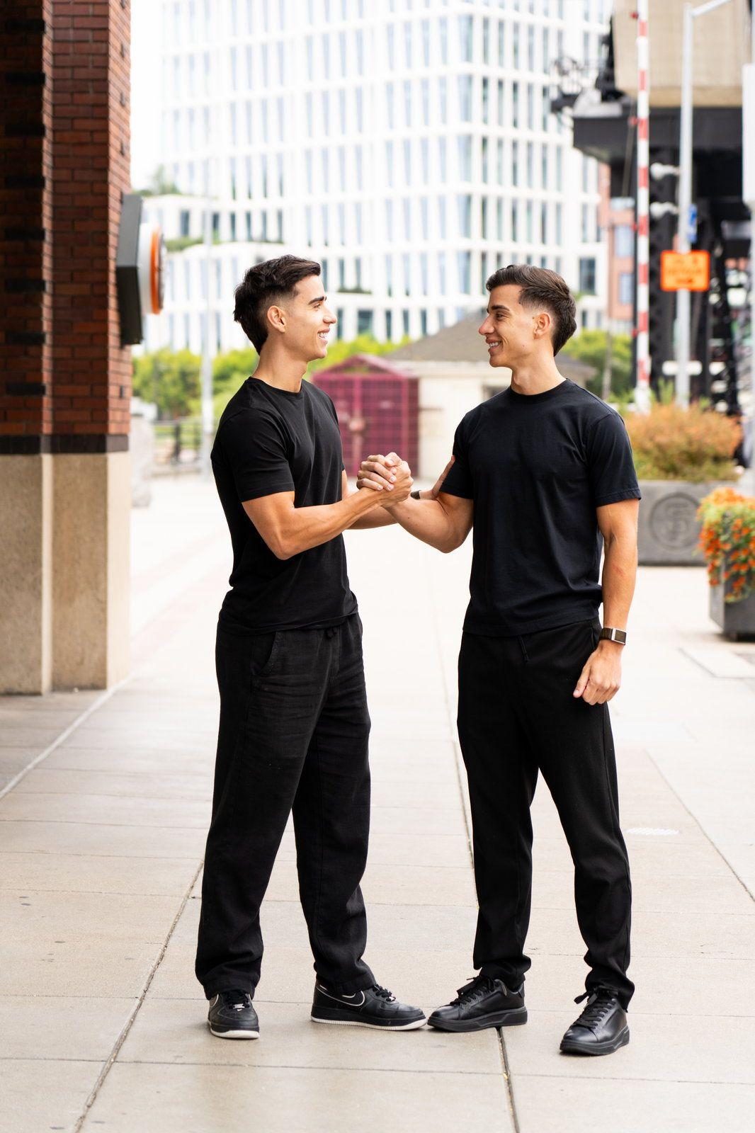 Alberto and Alejandro Rosas shaking hands — the bar Didit hires against.